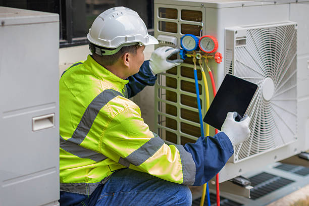 Professional Hvac technician working in Manchester, NH